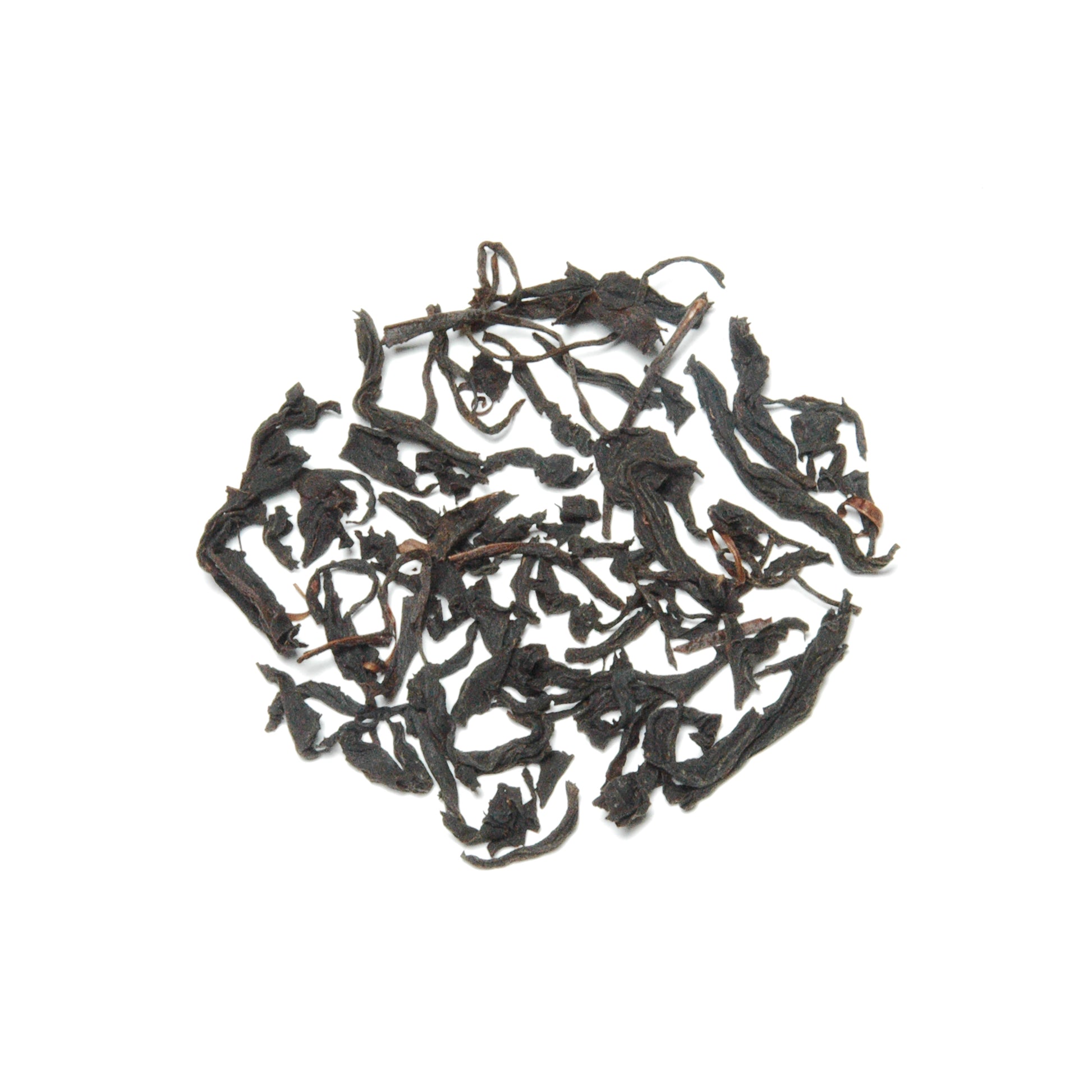 Fully oxidized and roasted narcissus tea with orchid-like floral aroma and maltose notes from longan wood roasting.