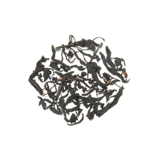 Fully oxidized and roasted narcissus tea with orchid-like floral aroma and maltose notes from longan wood roasting.