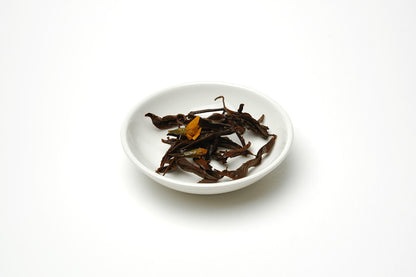 Citronringblomma svart te